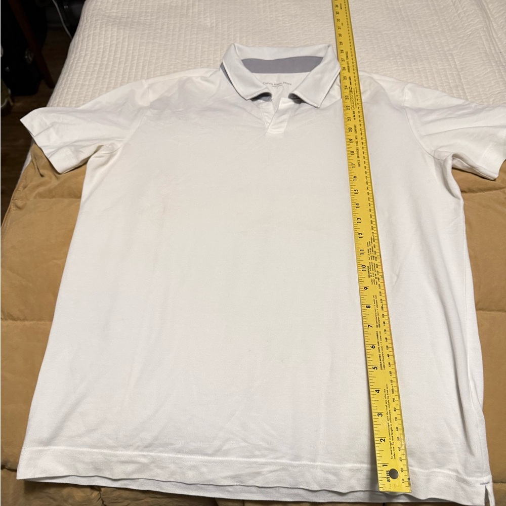 Calvin Klein White Polo Shirt. Light, stretch and fashionable men’s